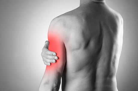 Man with biceps pain — Jersey City, NJ — Pain and Disability Institute