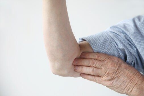 Elderly with elbow pain — Jersey City, NJ — Pain and Disability Institute