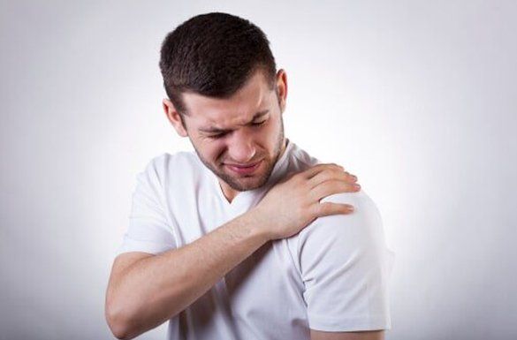 Man having a left shoulder pain — Jersey City, NJ — Pain and Disability Institute