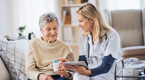 Medicaid Planning — Doctor Explaining Medication For A Senior Woman in Norristown, PA