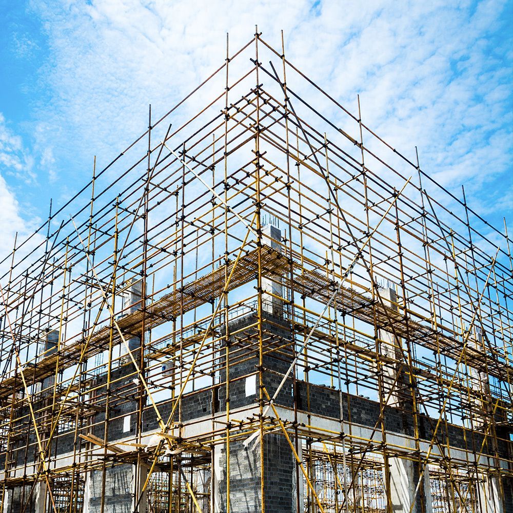 A large building is being built with scaffolding around it.