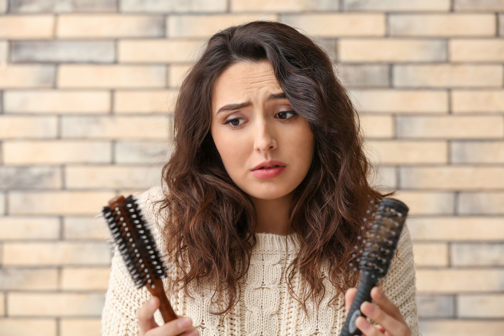 Woman Worried About Hair Loss — Greensburg, PA — Allanté Hair Design and Spa