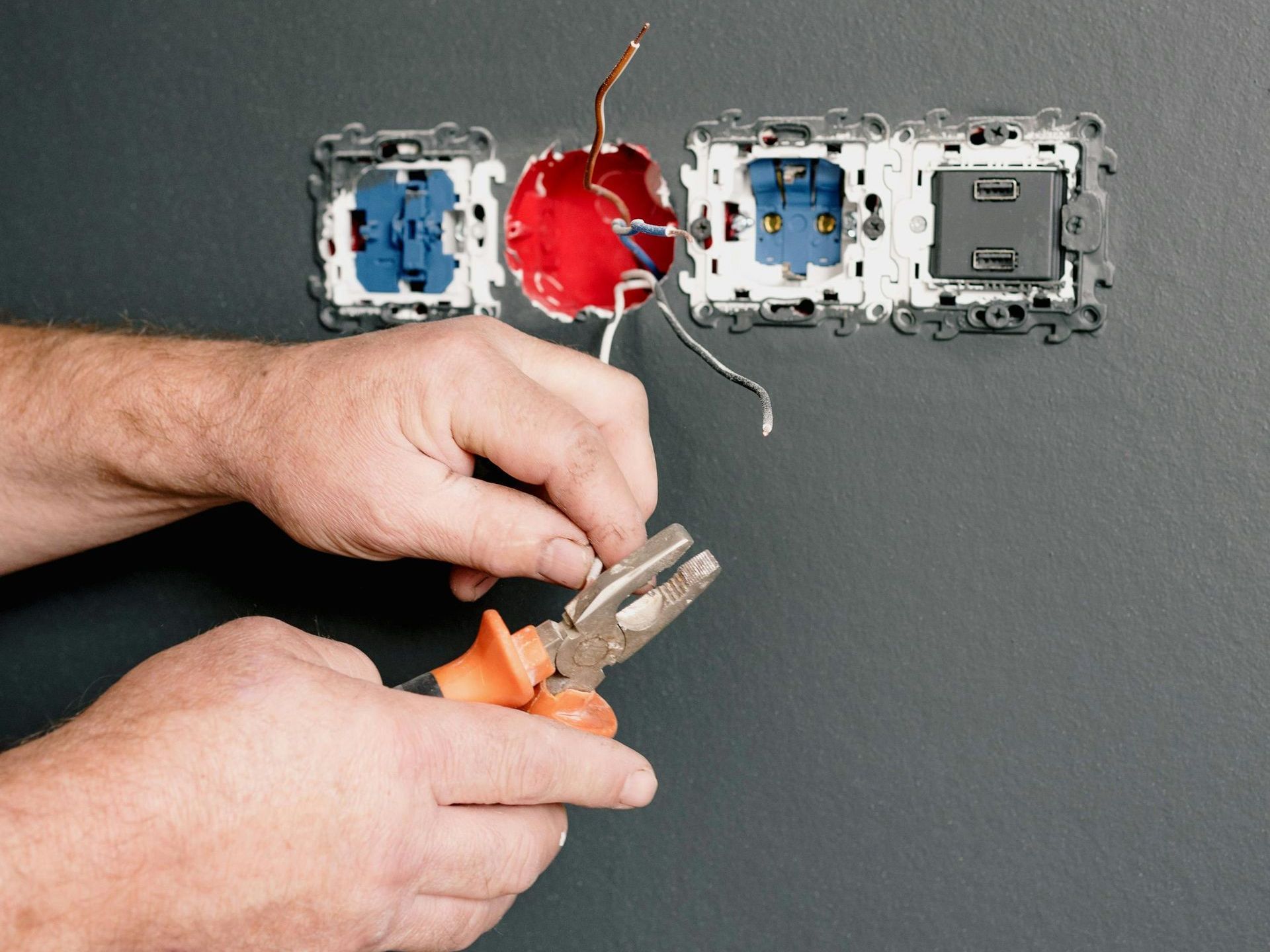 Electrical technician preparing residential panel for hurricane season | Ashley River Wired