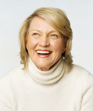 Senior woman smiling, close-up