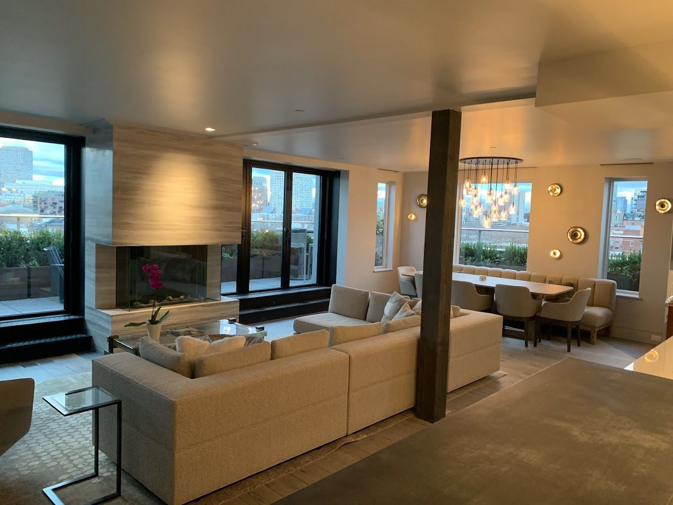 A living room filled with furniture and a fireplace.