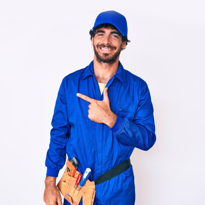 Handyman in cover all blue suit