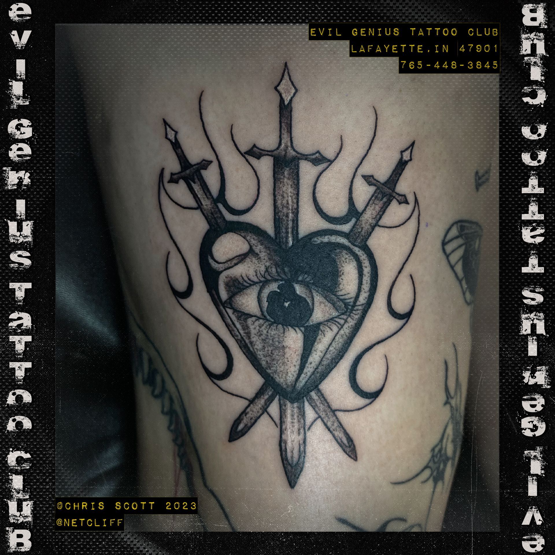 heart with daggers tattoo by Chris Scott