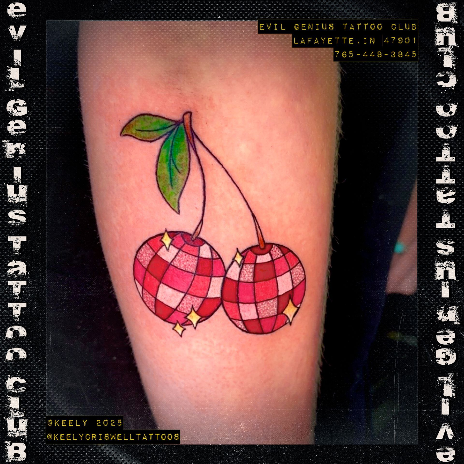 Cherry disco ball tattoo done by Keely Crsiwell 