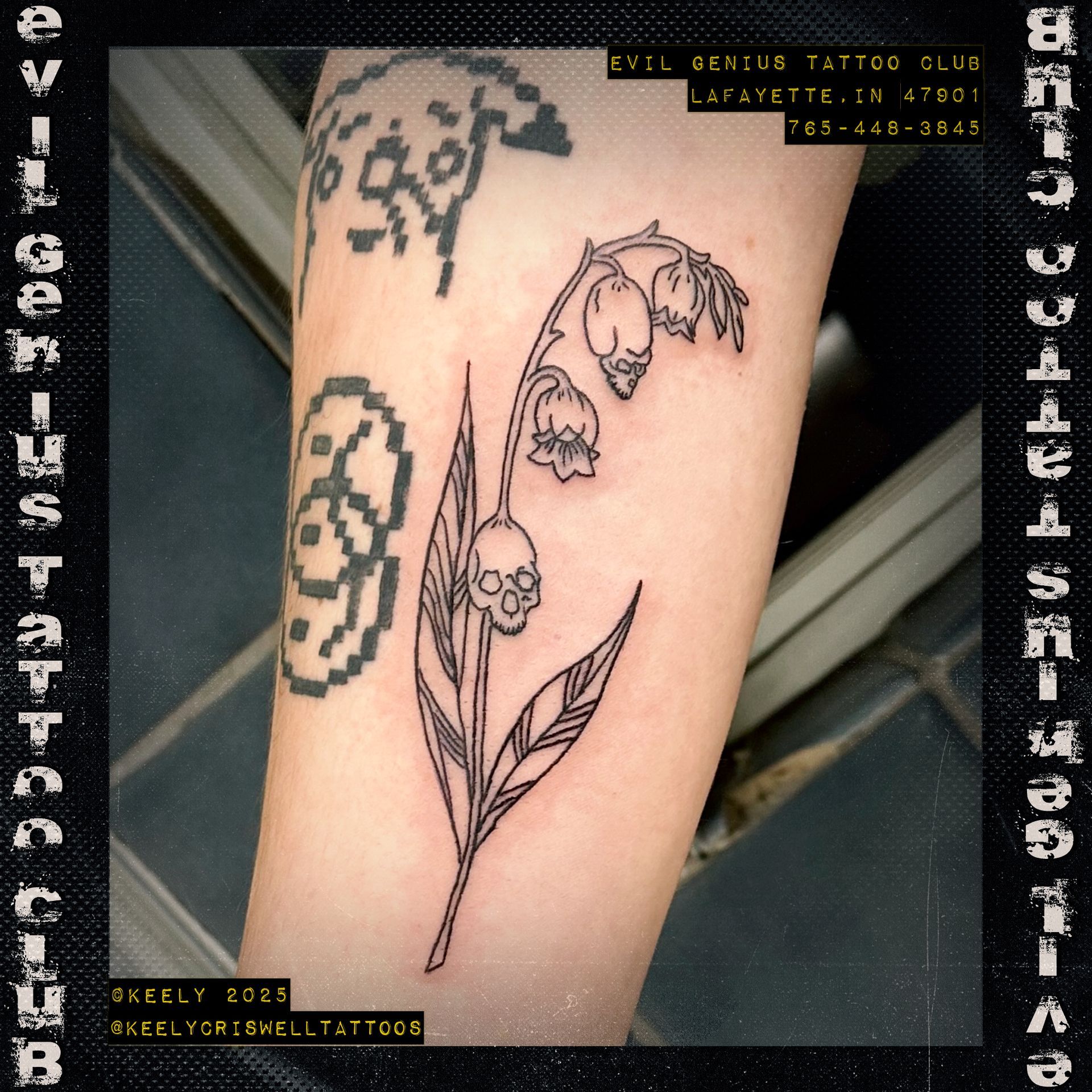Tattoo of lily of the valley by Keely Criswell.