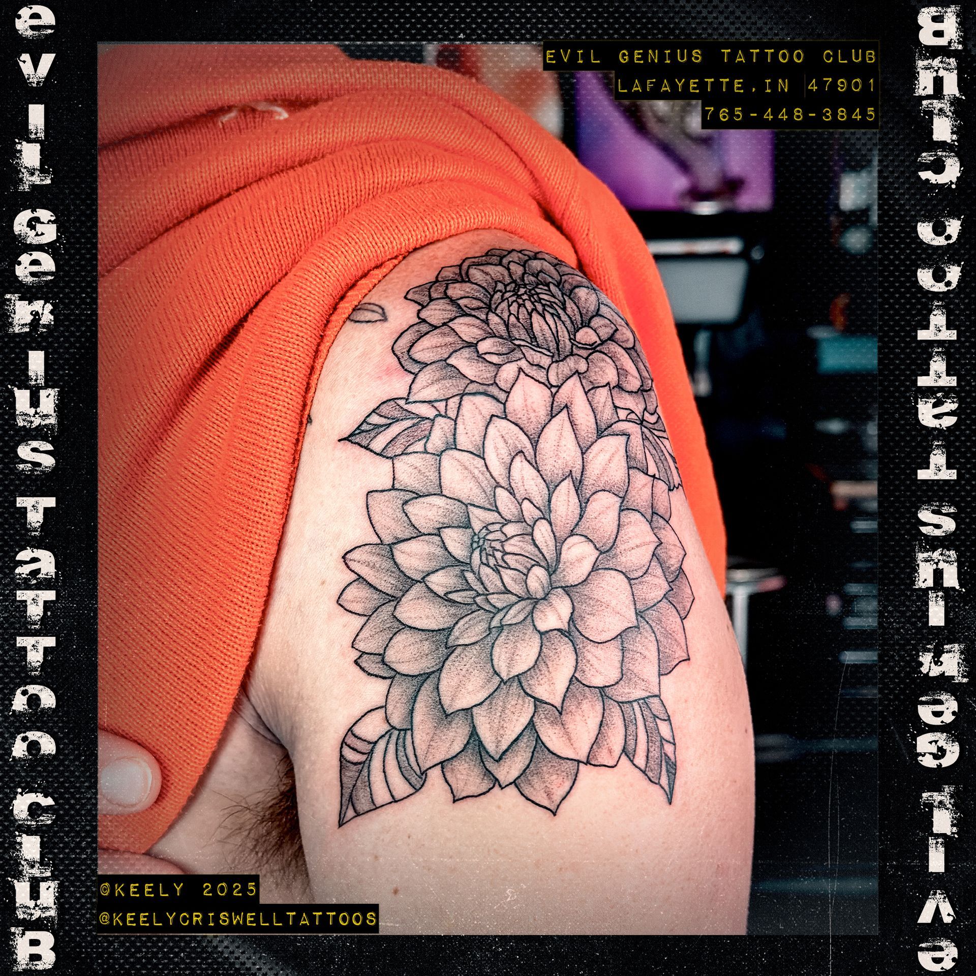 Black and white dahlia tattoo by Keely Criswell.