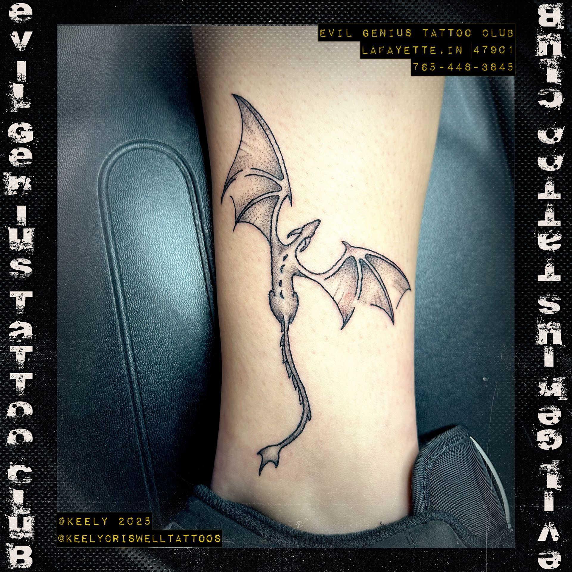 Dragon in flight tattoo by Keely Criswell. 