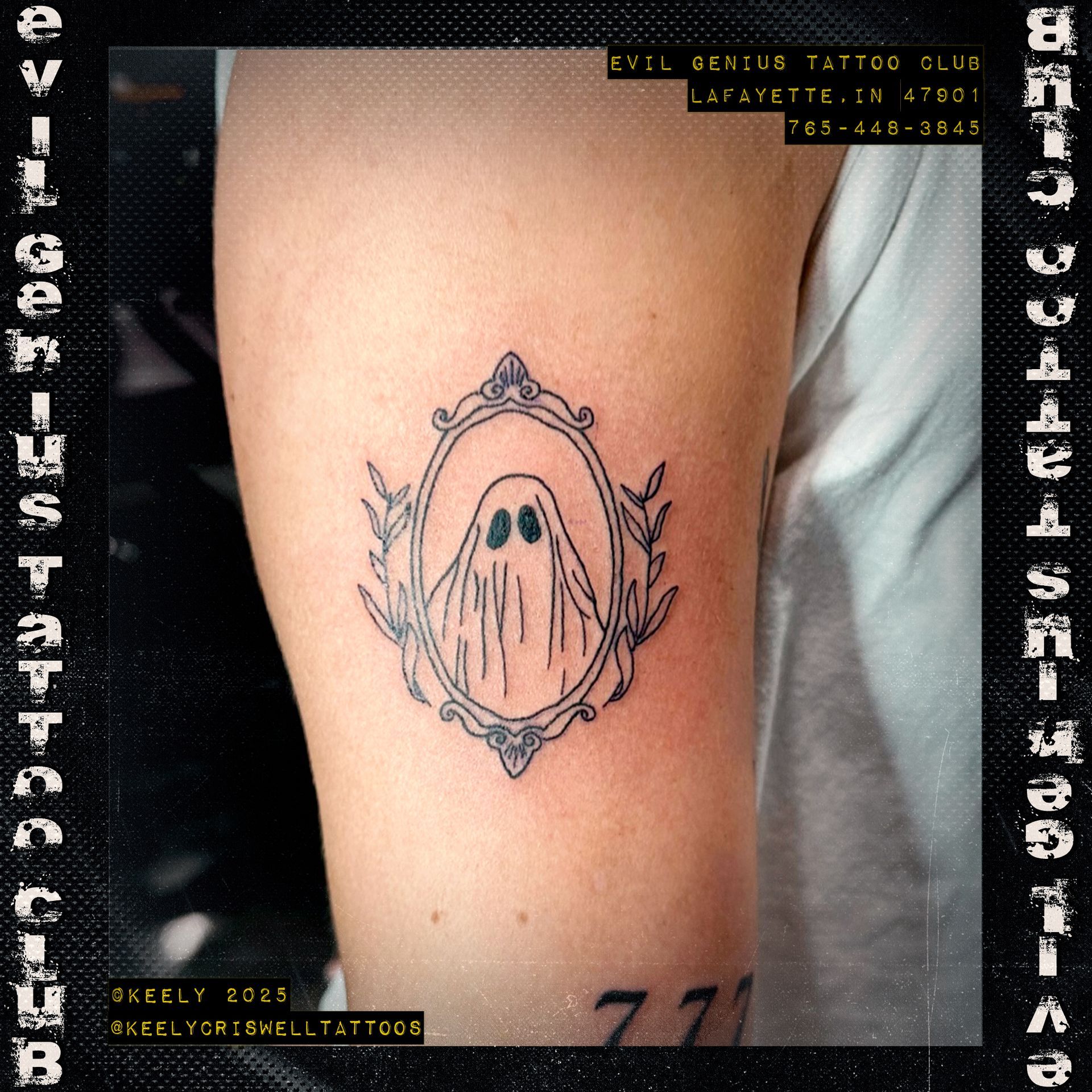 Tattoo of a ghost in a decorative mirror frame by Keely Criswell.