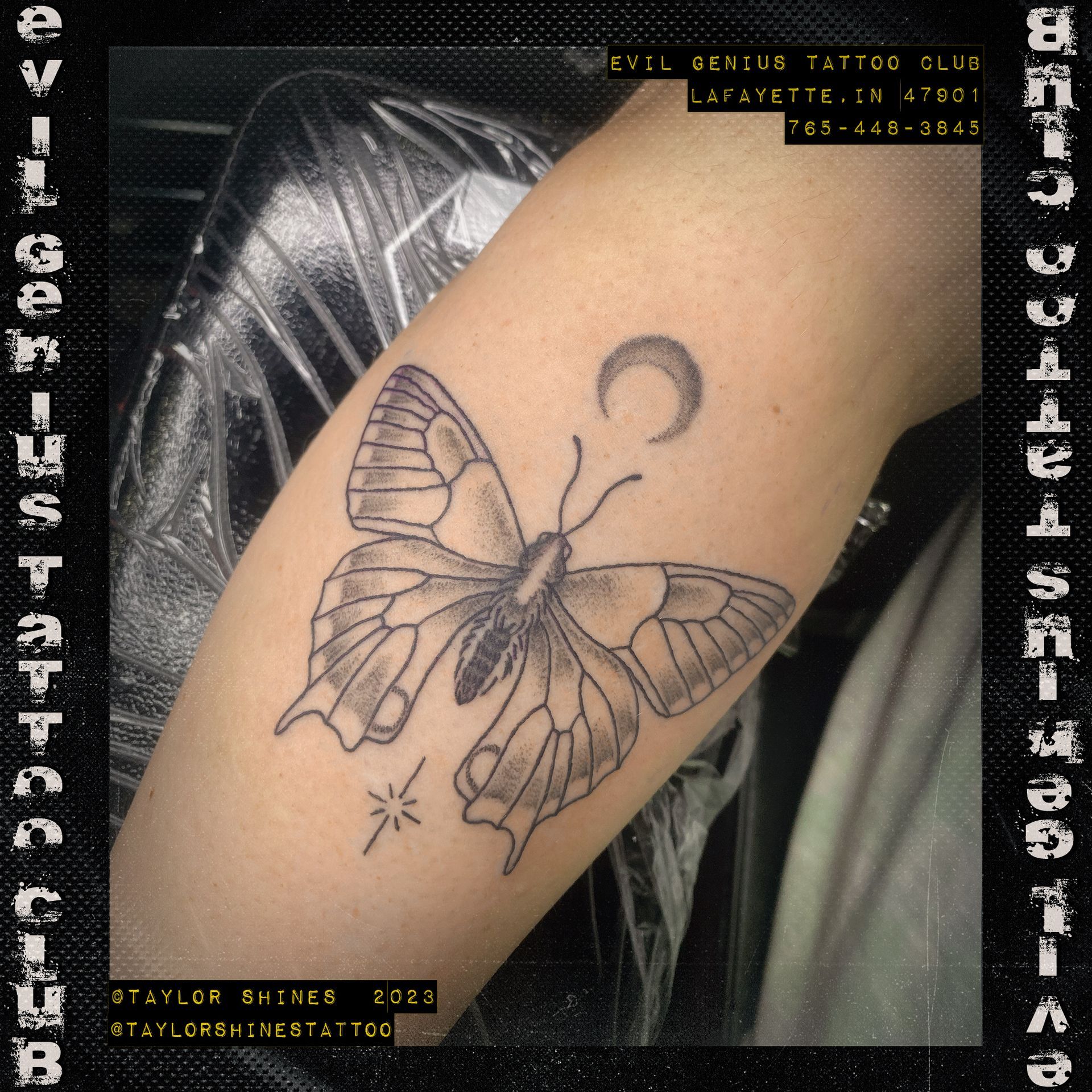 A tattoo of a butterfly on a person 's arm done by Taylor Shines