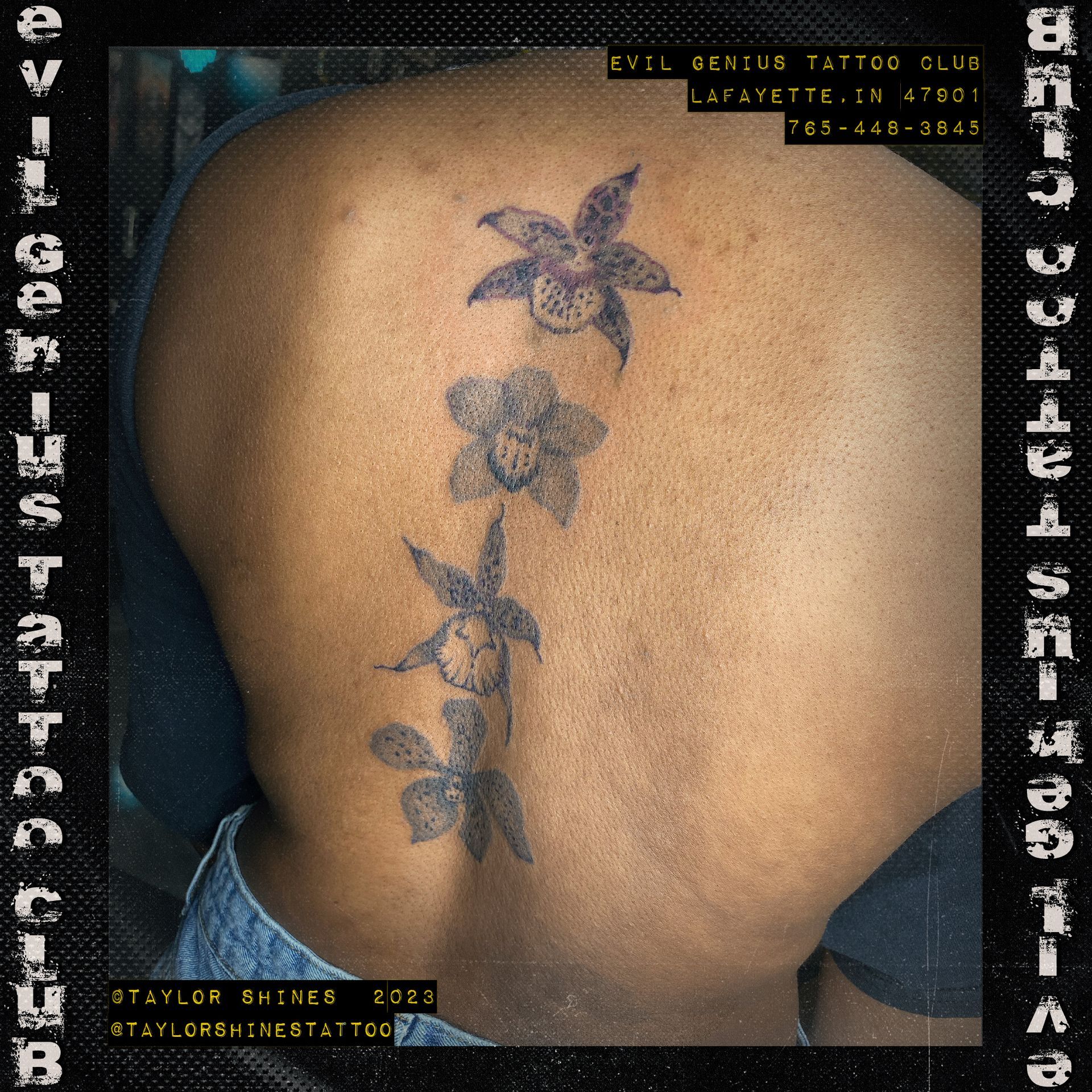 Floral tattoos down the spine, done by Taylor Shines