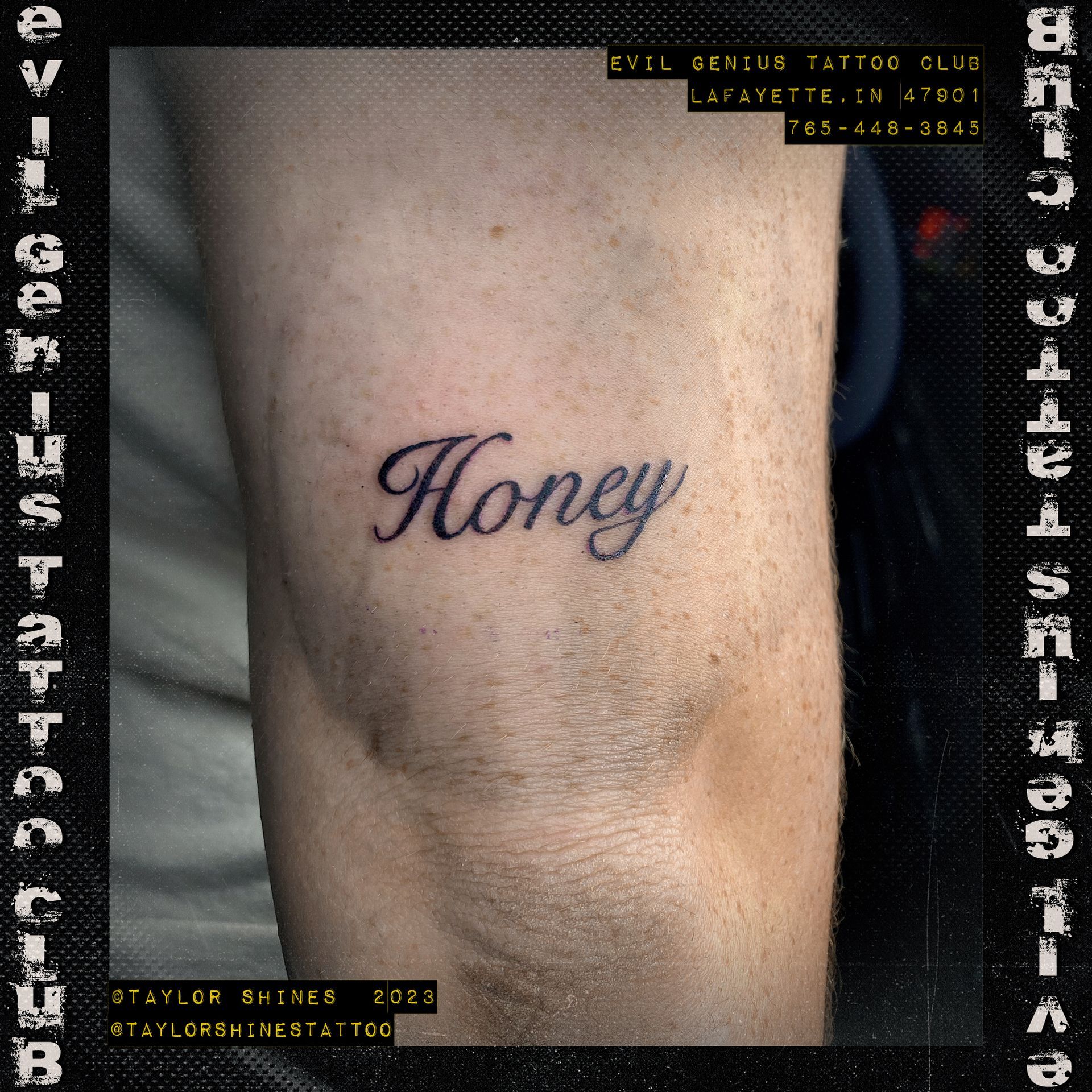 A tattoo of the word honey on a man 's arm done by Taylor Shines