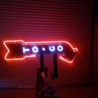 A bunch of white letters are stacked on top of each other.