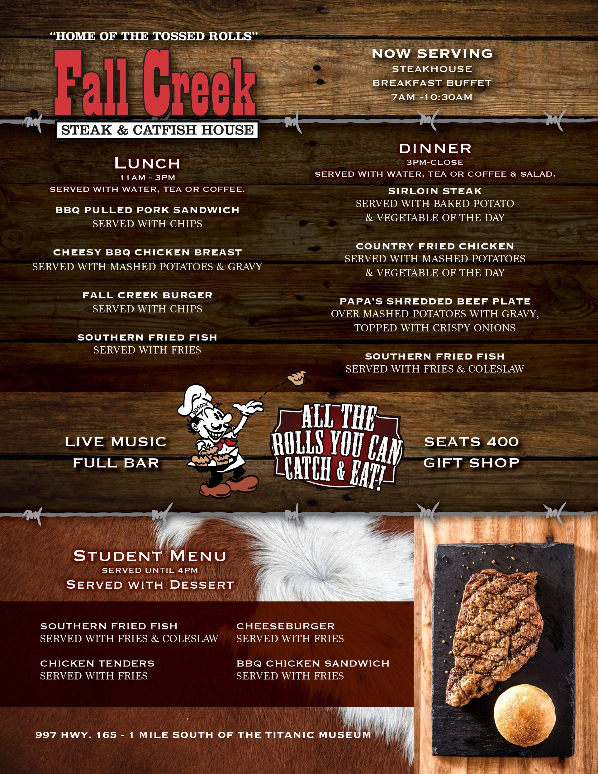 A menu for a restaurant called fall creek is displayed on a wooden table.