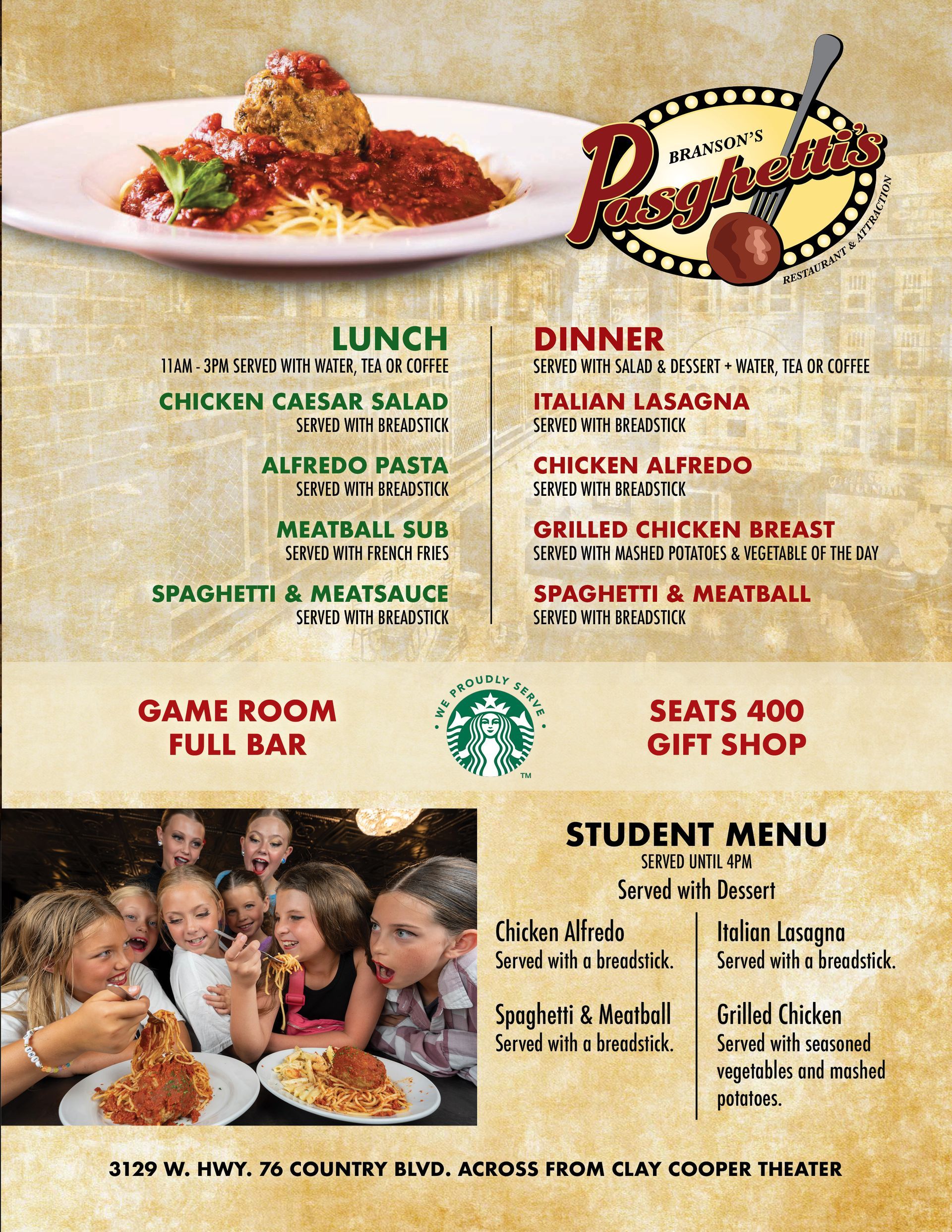 A menu for a restaurant with a picture of a group of people eating food