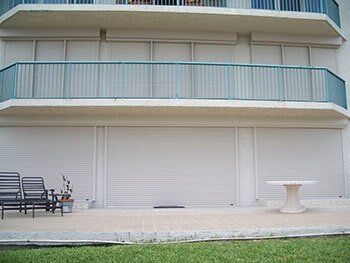 Storm shutter into the whole building — hurricane shutters Ormond Beach FL in Ormond Beach, FL
