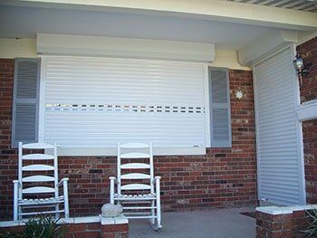 White hurricane shutter — hurricane shutters Ormond Beach FL in Ormond Beach, FL