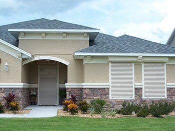 Storm shutter in a new house — hurricane shutters Ormond Beach FL in Ormond Beach, FL