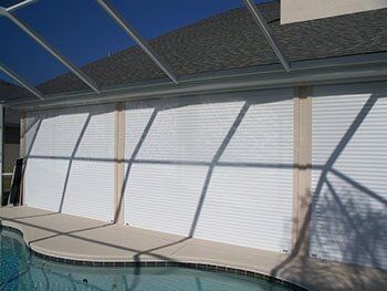 Storm shutter and pool — hurricane shutters Ormond Beach FL in Ormond Beach, FL
