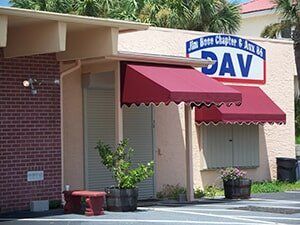 Storm shutter in a building — hurricane shutters Ormond Beach FL in Ormond Beach, FL