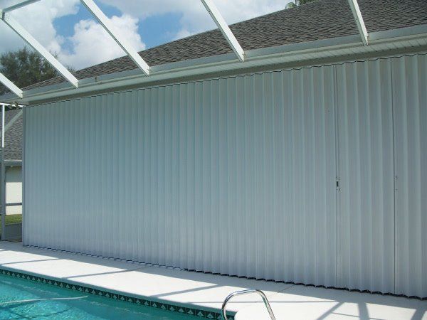 Accordion pool enclosure closed — hurricane shutters Ormond Beach FL in Ormond Beach, FL