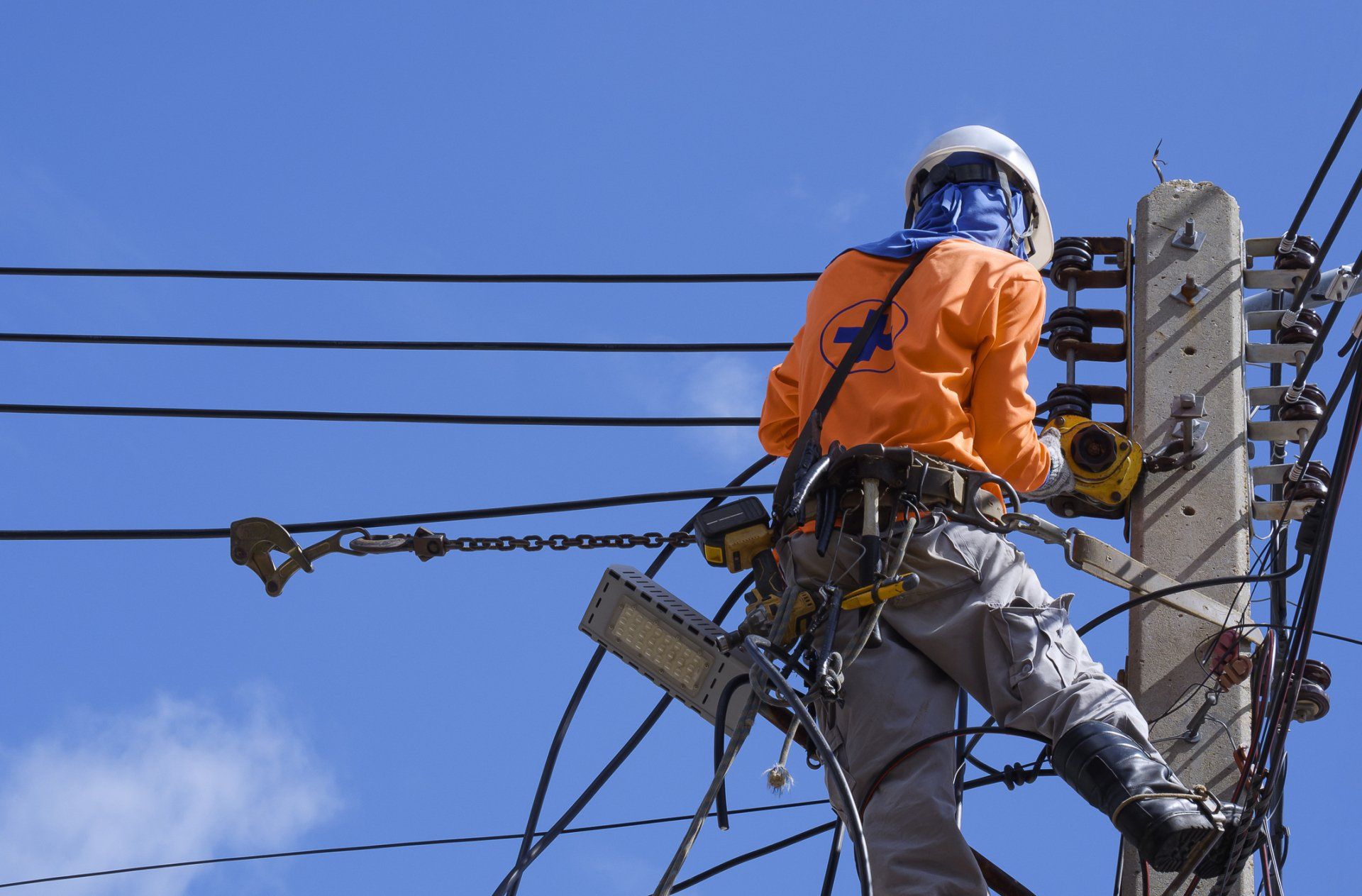 Electrician Installing Cable Lines — Ipswich QLD — Enever Electrical Pty Ltd