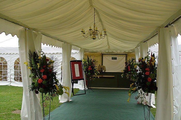 the reception area of a marquee for corporate events