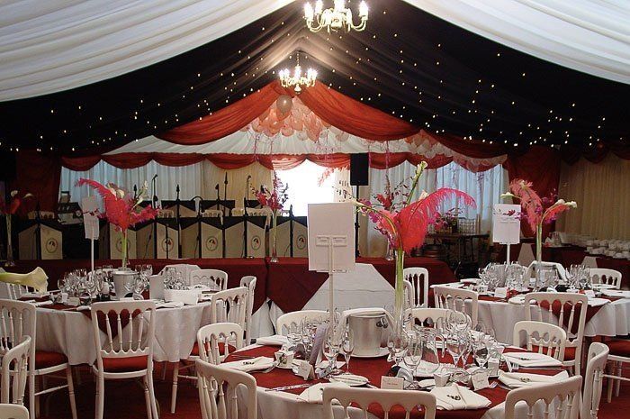 seating and event decorations with red and white theme