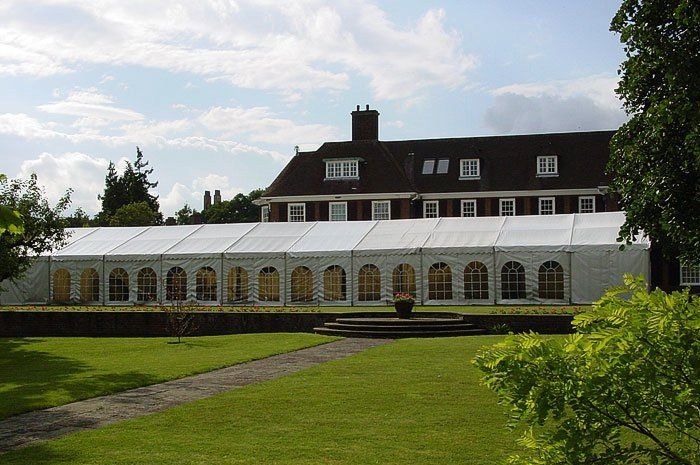 marquee constructed near a beautiful residential building