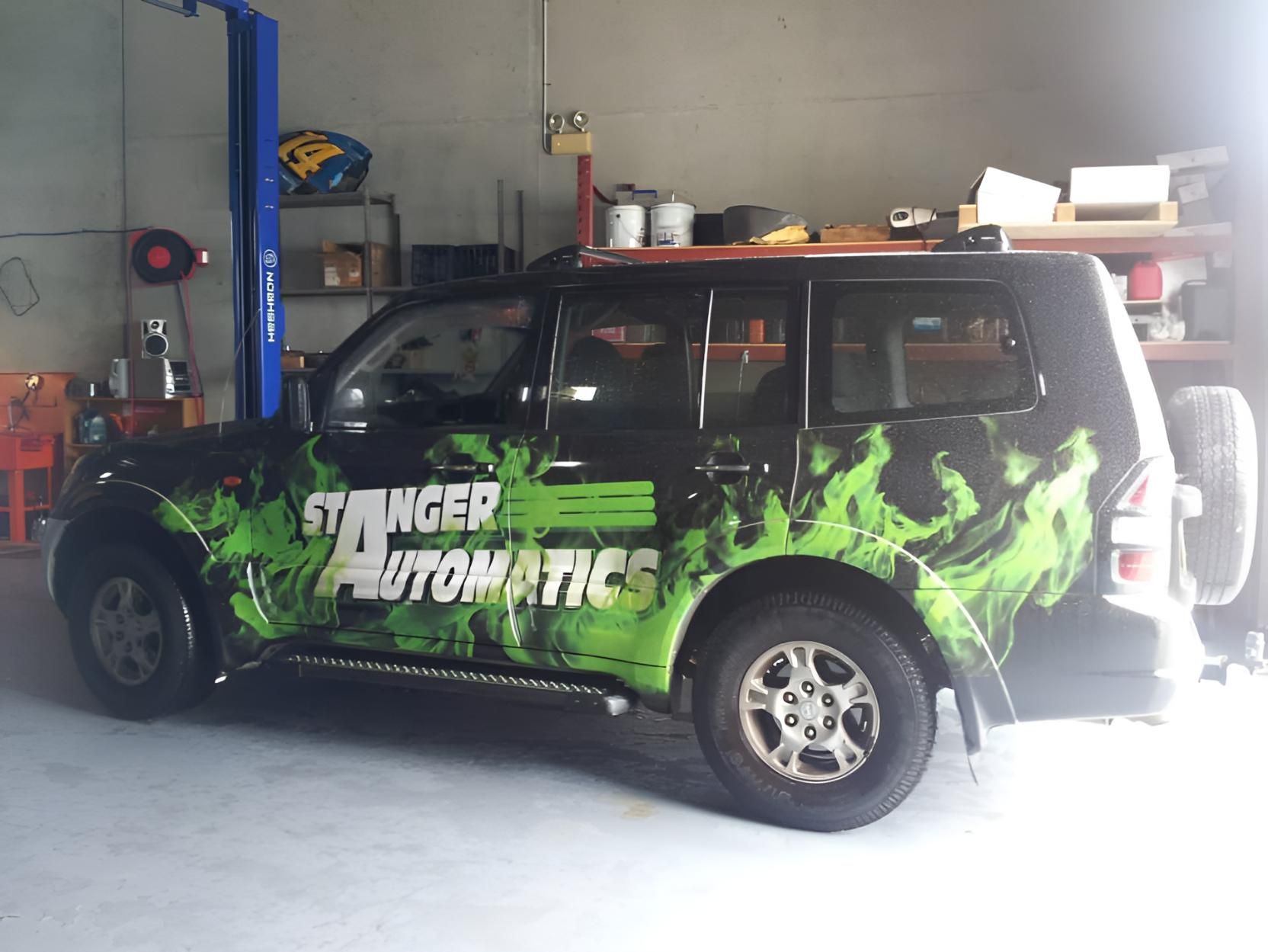 A Green And Black Suv With The Words Stronger — Stanger Automatics In Ballina, NSW