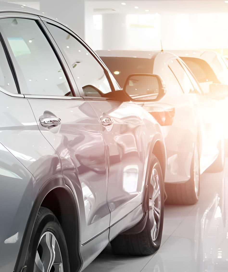 A Row Of Cars Are Parked In A Showroom — Stanger Automatics In Ballina, NSW