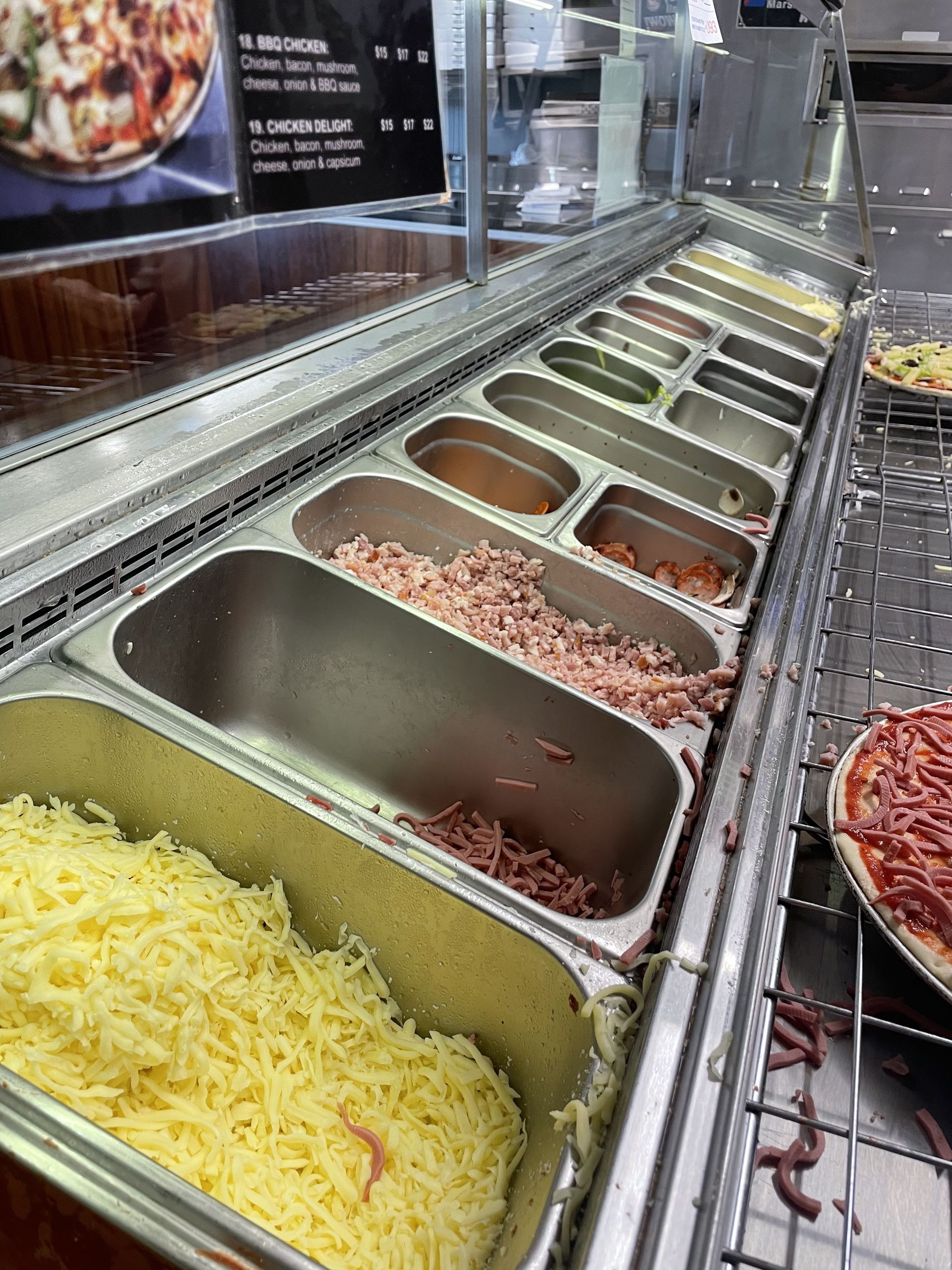 There Are Many Different Types Of Food In The Trays — Bel-Air Pizza In Port Macquarie, NSW