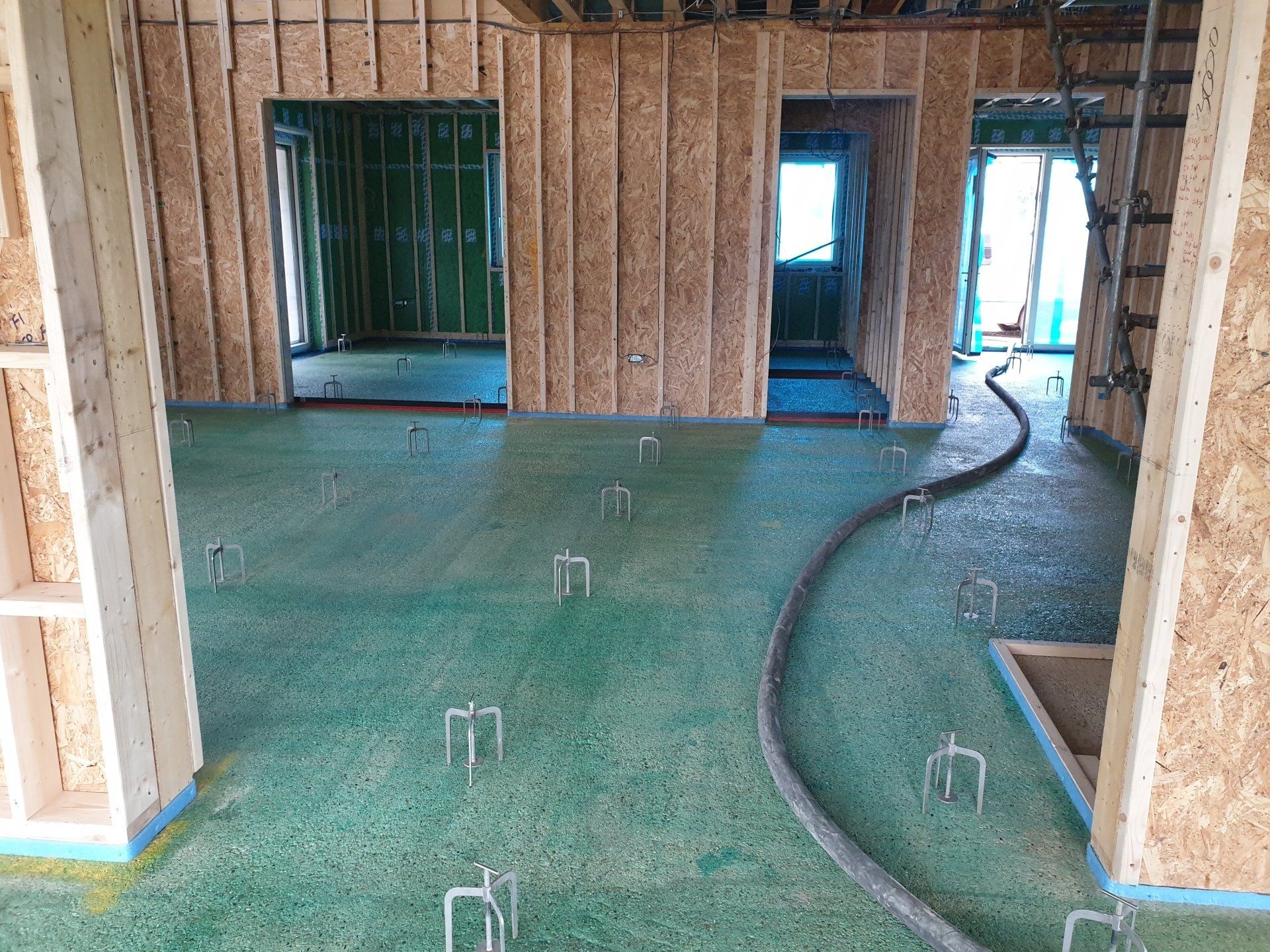 Floor primed and ready for a bonded liquid screed installation.