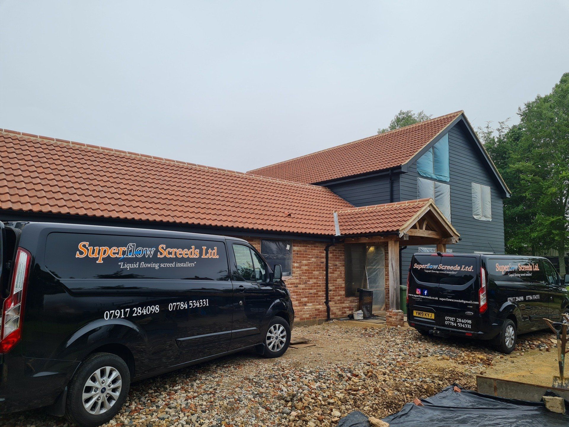 Vans parked outside one of our jobs.