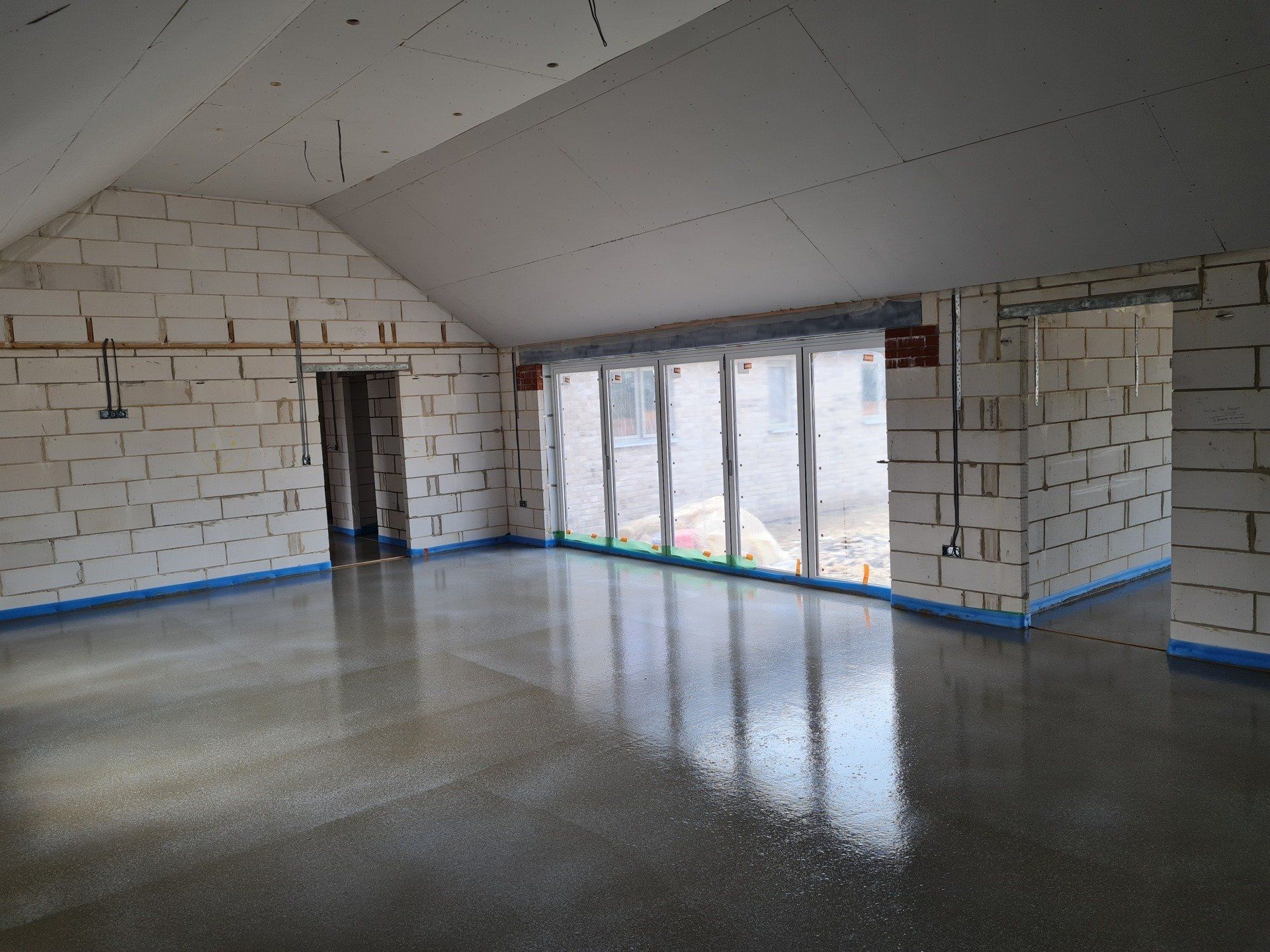 Cemfloor liquid screed installed in a large bungalow in Carbrooke, Norfolk.