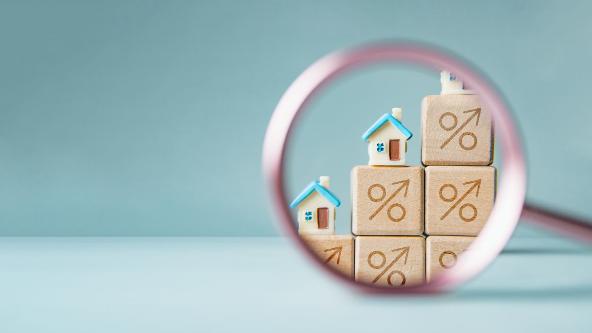 Hands flanking wooden blocks with gift, customer, and discount icons.