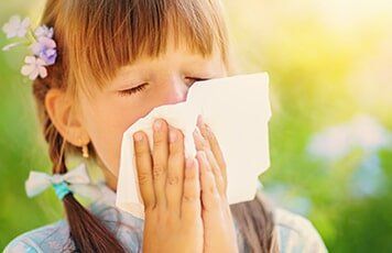 Girl Sneezing — Allergy Clinic in Idaho Falls, ID