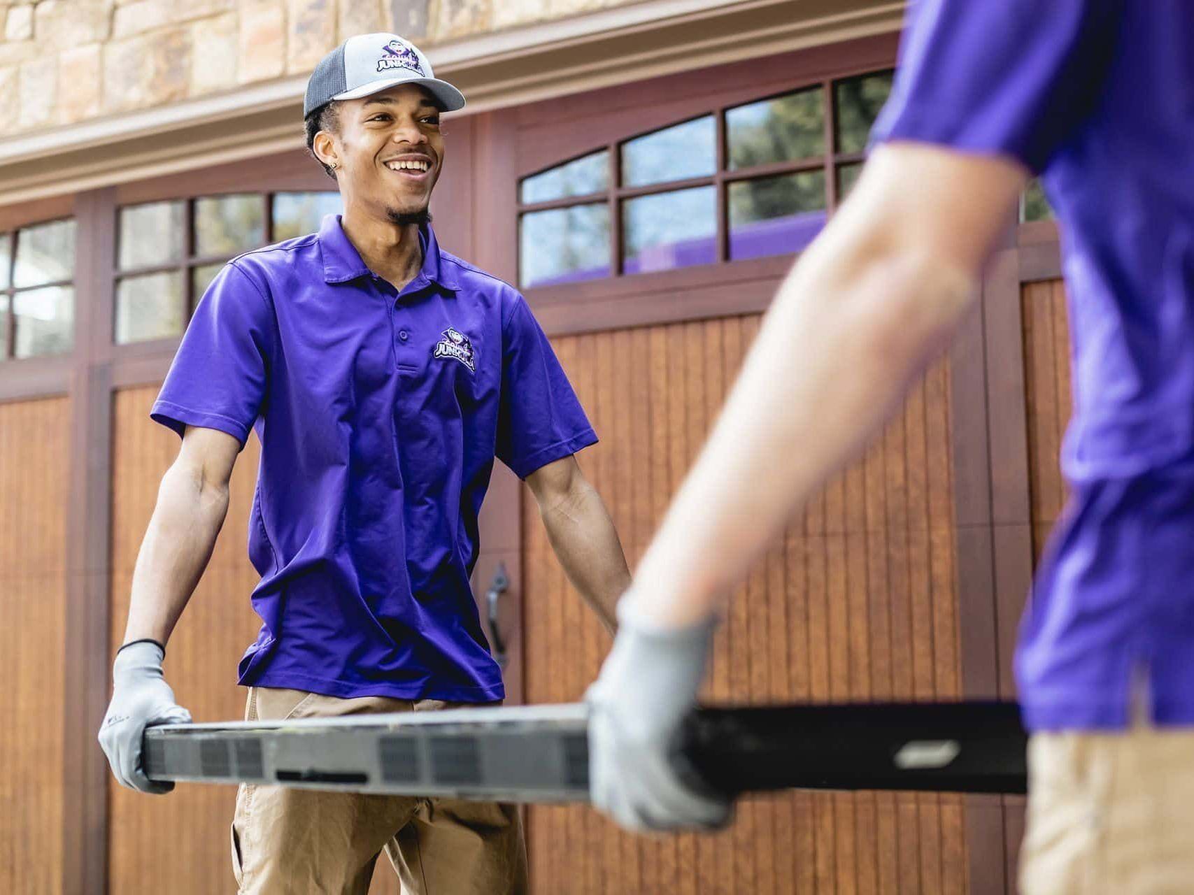 Count Junkula removing trash from a residential home