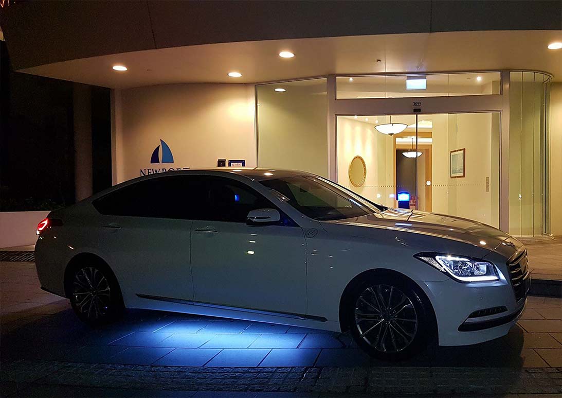 White Car With Underground Blue Light — Limo Hire in Gold Coast, QLD