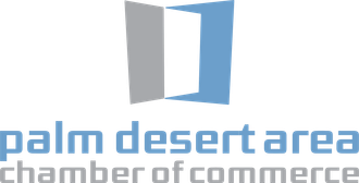 Logo for the Palm Desert Area Chamber of Commerce: stylized open door in blue and gray, with text below.