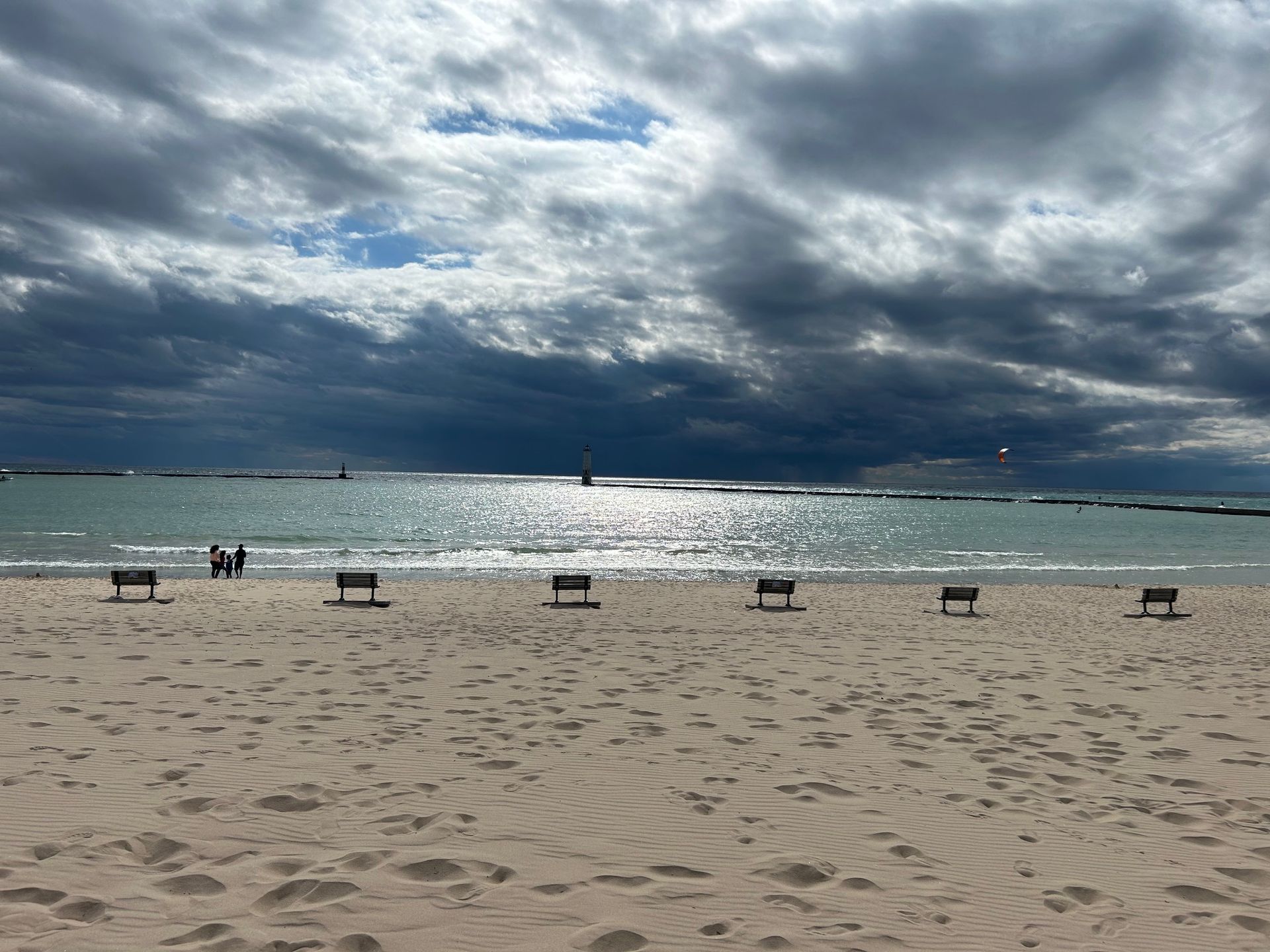 A beach with a cloudy sky