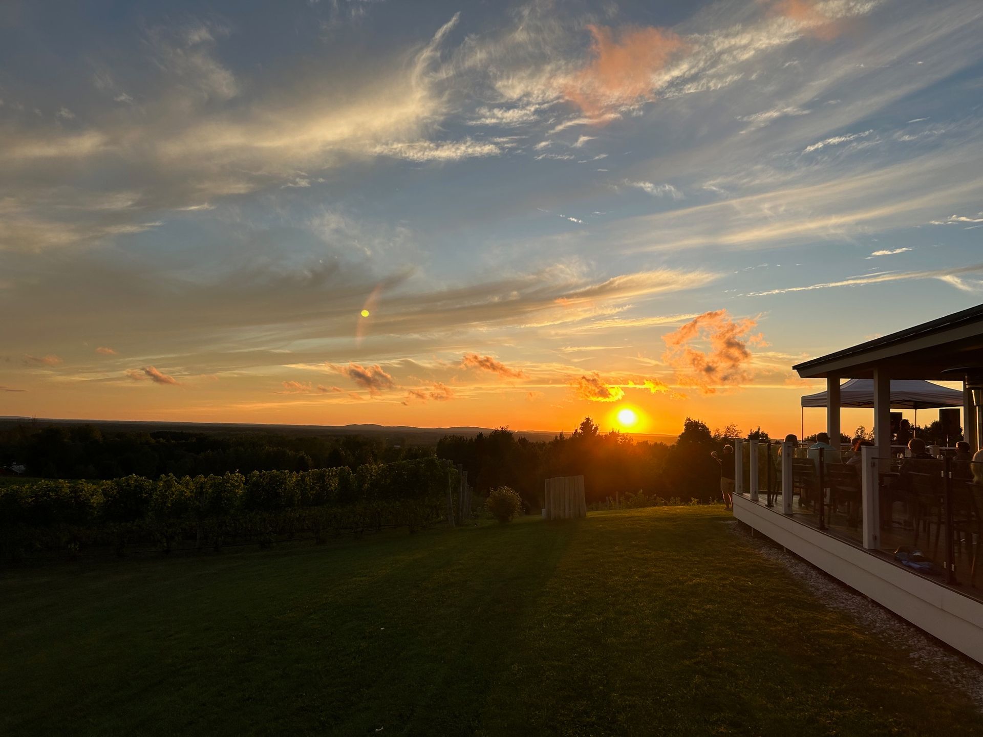 A sunset over a field