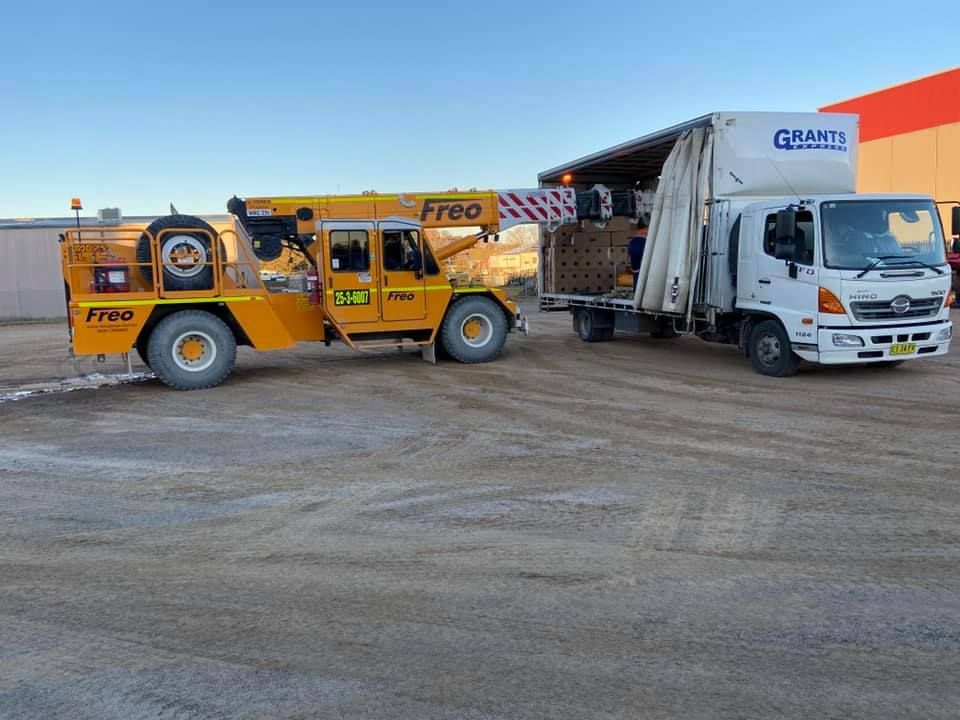 Yellow Truck With the Word Free on It — Grants Express in Cowra, NSW
