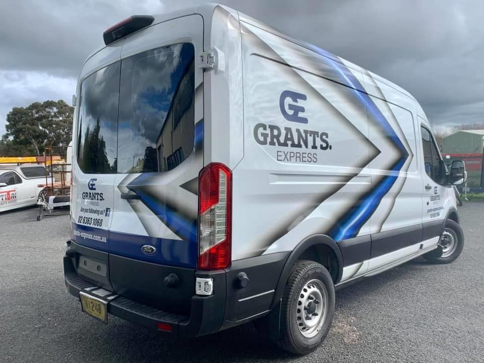 White Van With the Word Grants Express on It is Parked in a Parking Lot — Grants Express in Orange, NSW