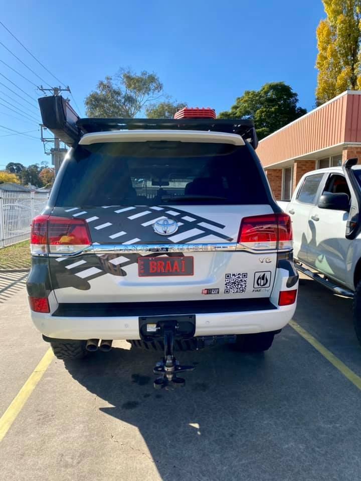 White Suv is Parked in a Parking Lot Next to a White Truck — Grants Express in Wetherill Park, NSW