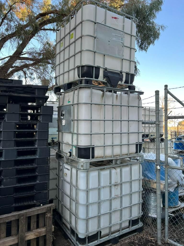Stack of Plastic Containers Sitting on Top of Each Other — Grants Express in Parkes, NSW