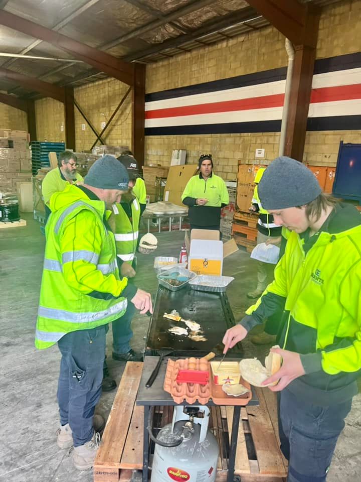 Group of People Are Cooking Food in a Warehouse — Grants Express in Orange, NSW